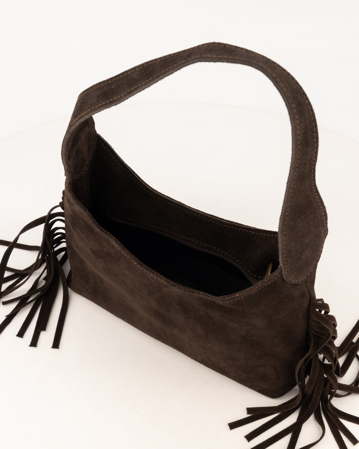 Suède Franjes handtas van Teatro, draagbaar als crossbody